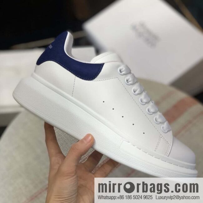 Alexander McQueen dark blue velvet tail sneakers