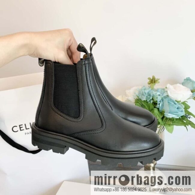 CELINE Celin in one pair of Chelsea booties